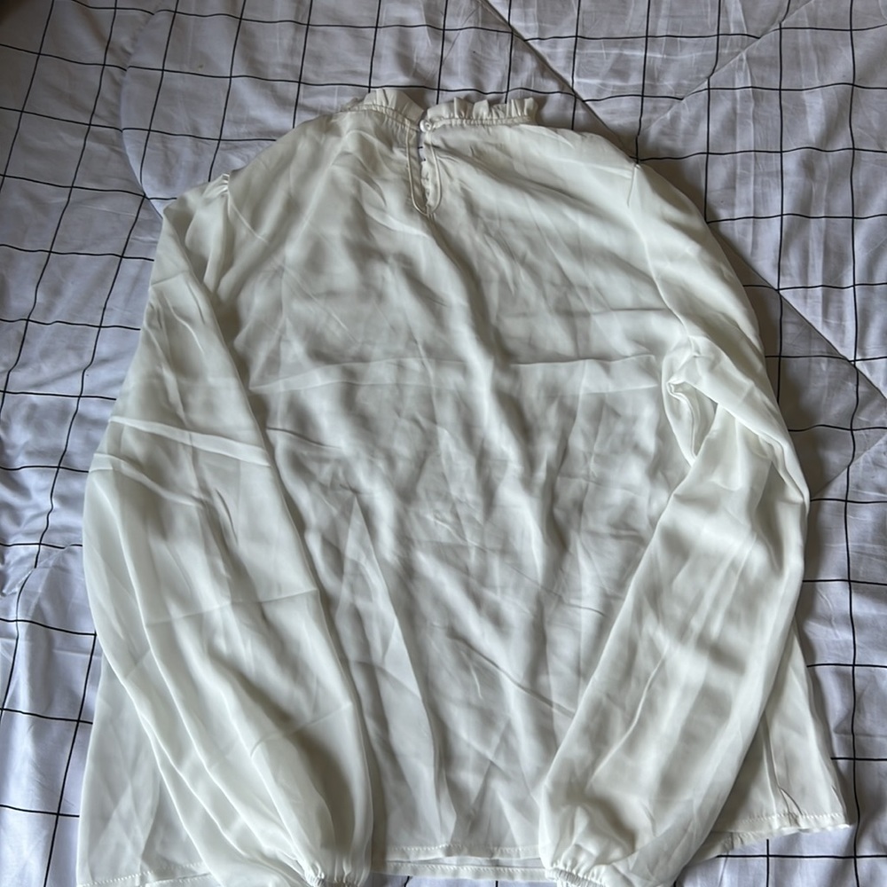 This beautiful shirt was to small for me around my arms. Very minimalist vibe. - Picture 1 of 4